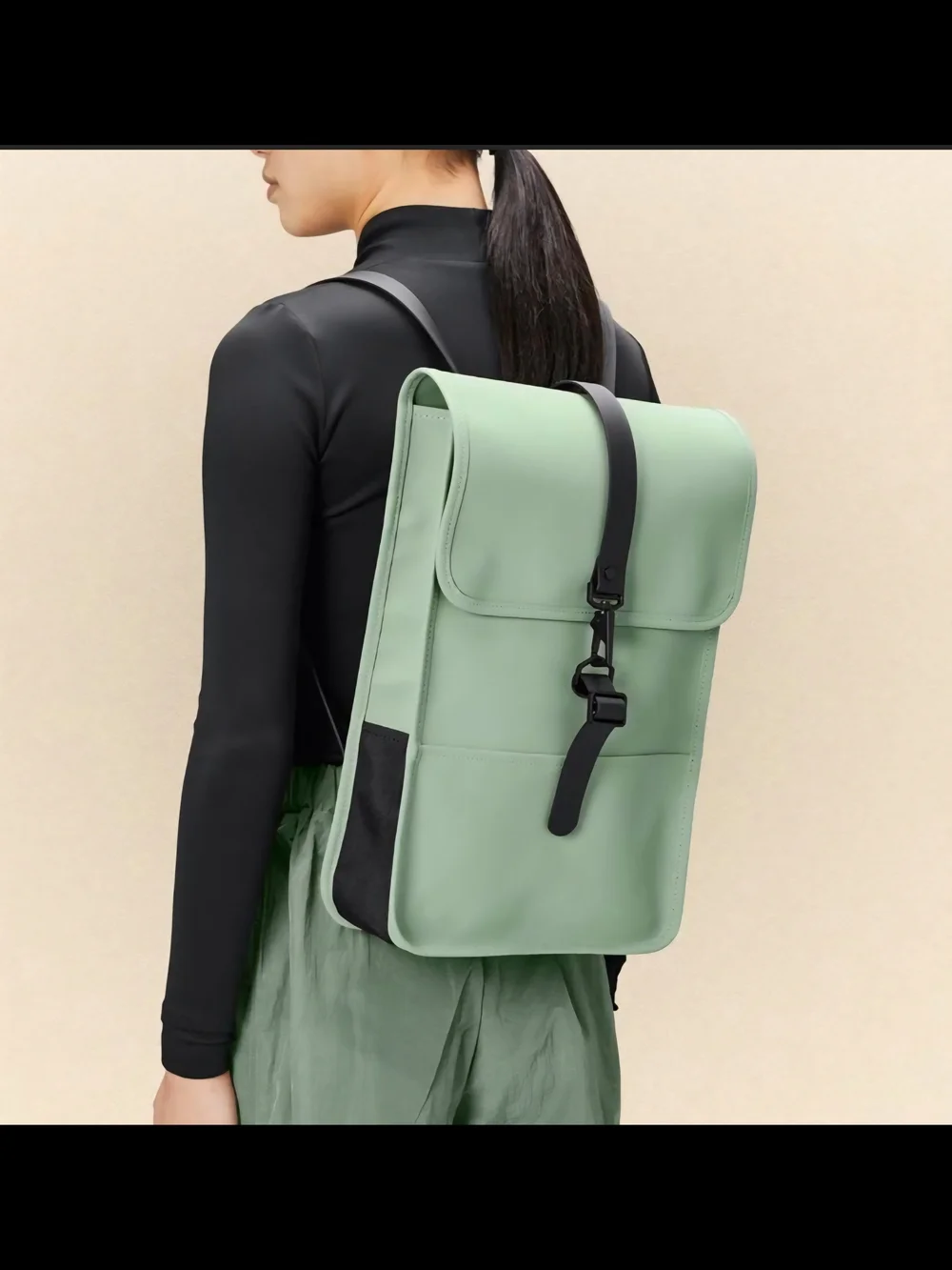Rains Mint Green Rolltop Backpack with Black Strap